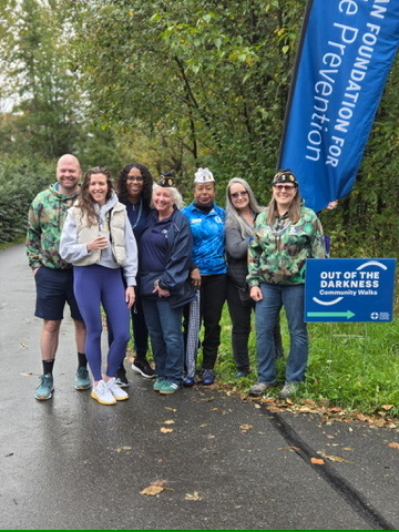 Community members gathered at an Out of the Darkness community walk